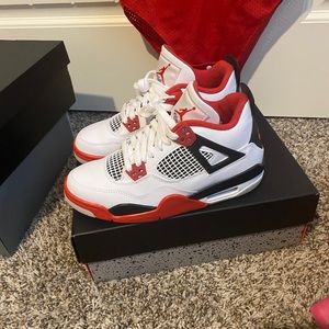 Fire red Jordan 4s